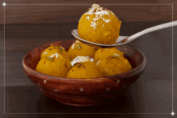 a bowl filled with Motichoor ladoo