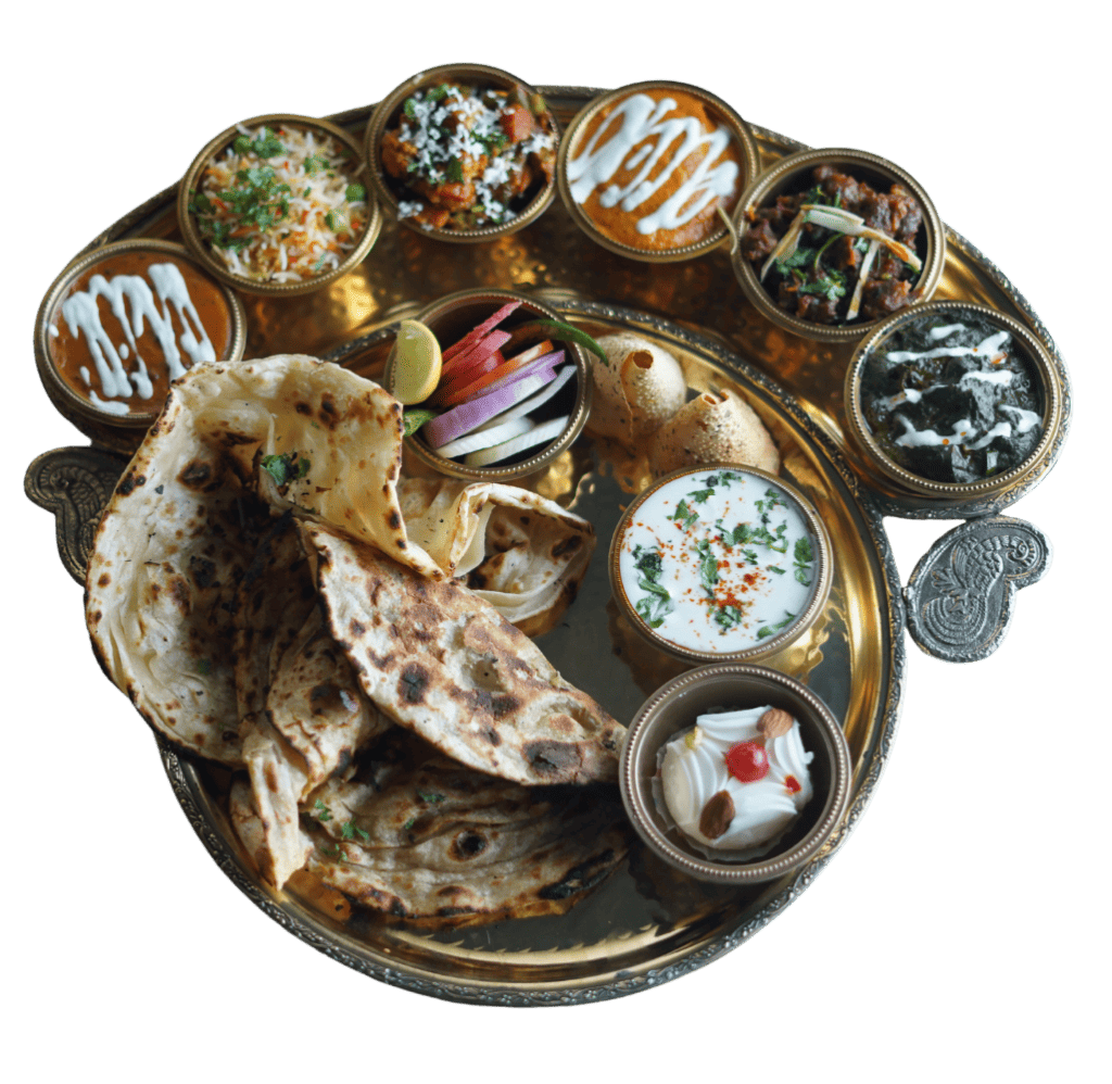 Indian Thali with naan, curries, raita, and pickles