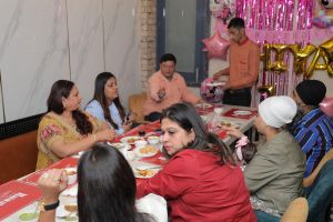 Group of people enjoying a meal at Halwaivala