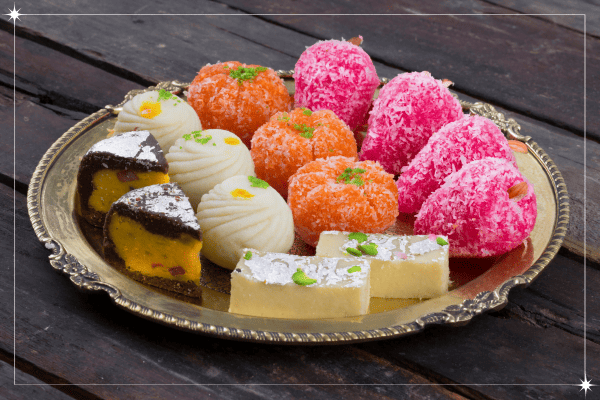 A plate full of different varieties of sweets